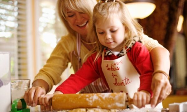 Know Your Priorities to Make Holidays Special- Mother and daughter baking cookies