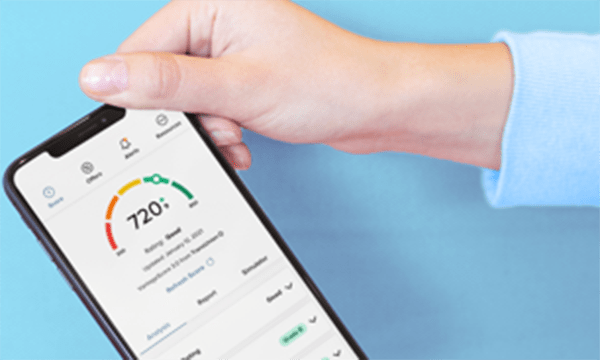 Hand holding smartphone displaying the Credit Savvy widget