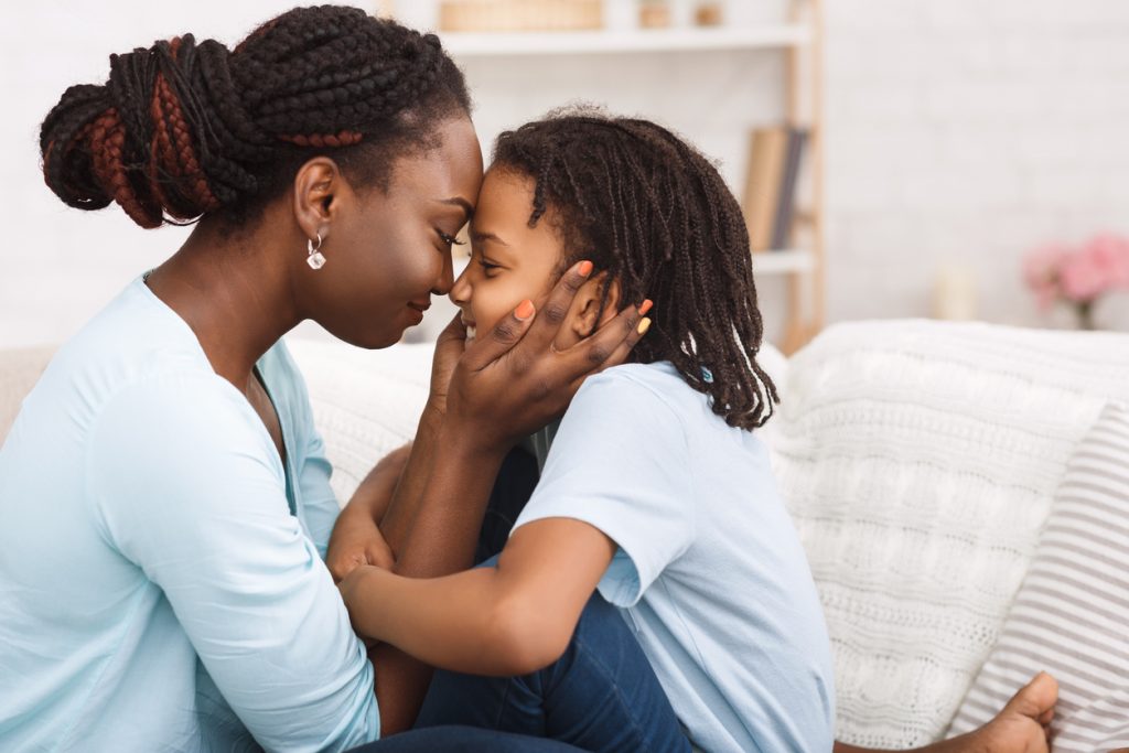 What You Need to Know about the 2021 Child Tax Credit | Loving african mom spending time with child