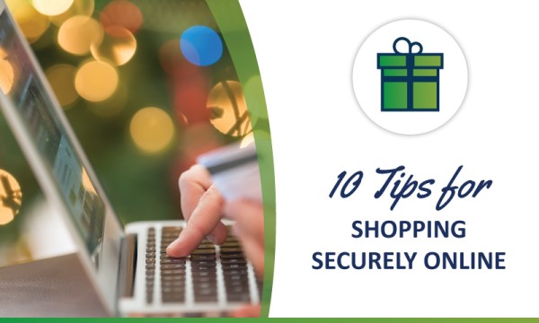 0 Tips Shopping Securely Online | Fingers typing on a laptop keyboard with Christmas feel in background